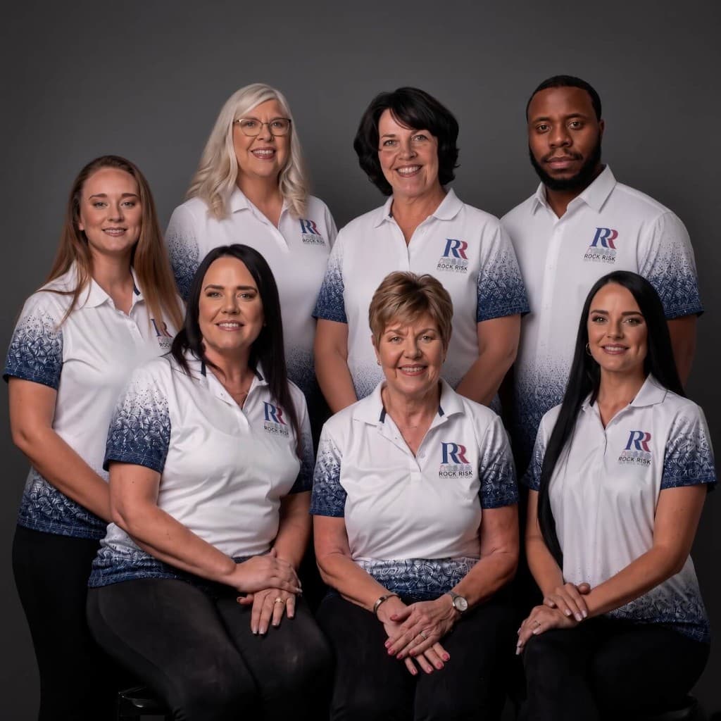 The Rock Risk team in branded polo shirts
